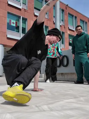 Break dancer outside of Kitchener City Hall