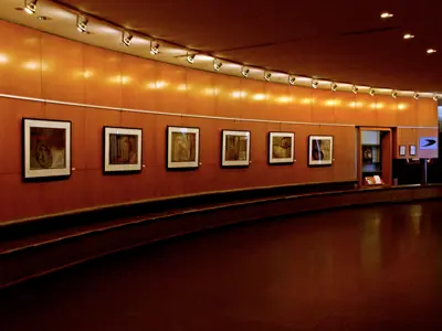 Pieces of art on the wall of the Rotunda Gallery at City Hall