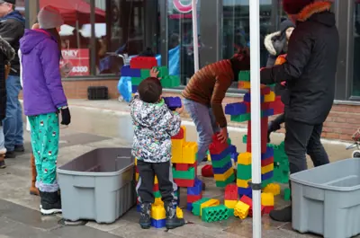 kids building a tower with blocks