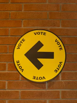 signage that says go vote