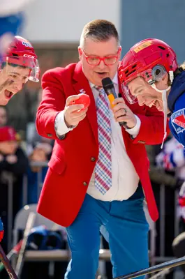 Two Kitchener Rangers player face off during the puck drop