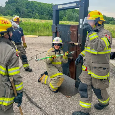 Group of participants posing for a photo during an interactive training session