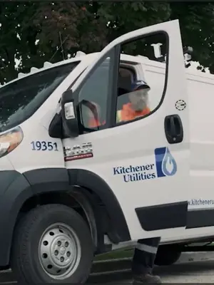 Man stepping out of Kitchener Utilities van
