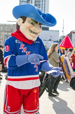 Tex, the Kitchener Rangers mascot, interacts with fans