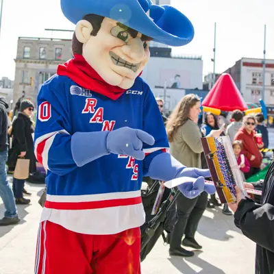Tex, the Kitchener Rangers mascot, interacts with fans