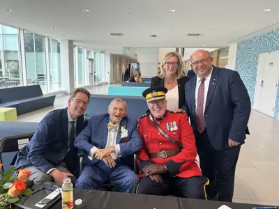 Goup of mayor council and dignitaries smiling