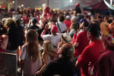 Patrons watching a performance during Canada Day festivities