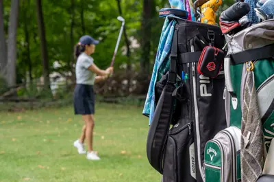 Female playing golf
