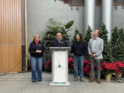 Mayor and council standing at podium